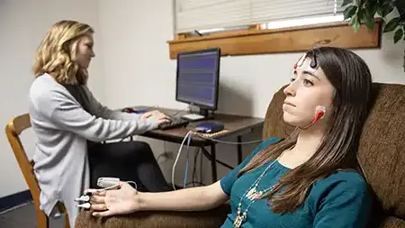 Patient hooked up to electronic monitoring.